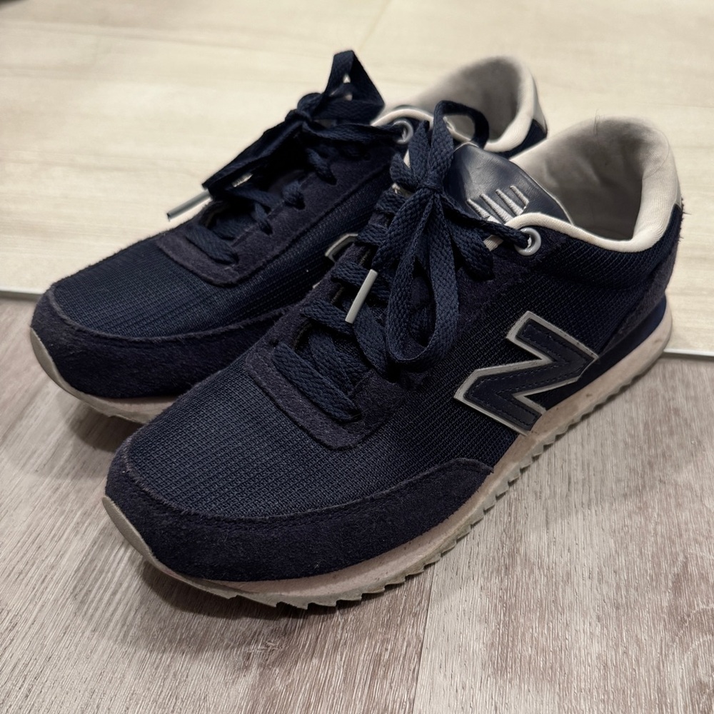 Navy Blue New Balance sneakers